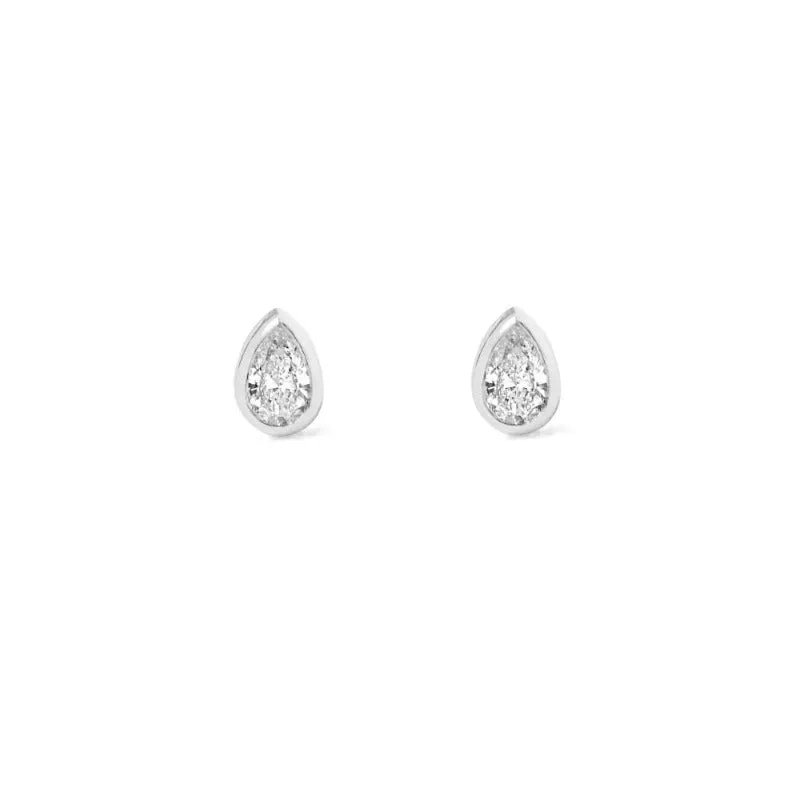 1/10 tcw. Pear Cut Diamond Bezel Earrings