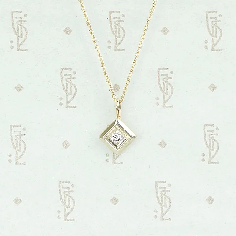 1920s Two Tone Gold and Diamond Pendant