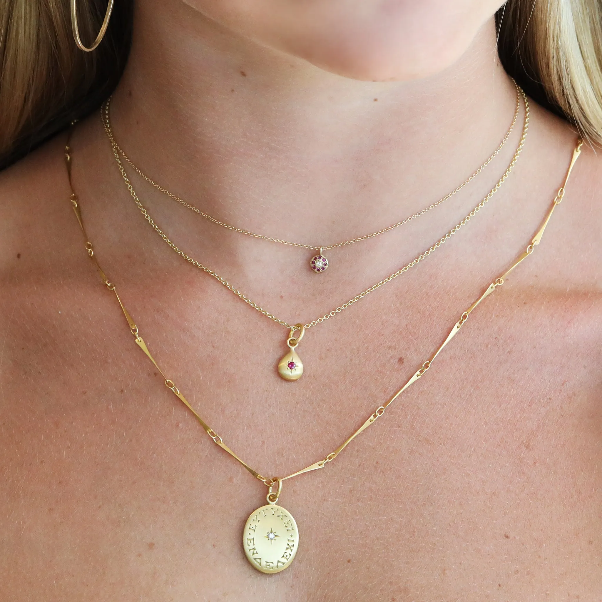 20K Gold Oval Pendant with Ancient Greek Engraving and Star-Set Diamond Center