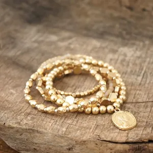 Boho Bracelet Stack with A Coin in Worn Gold Tone