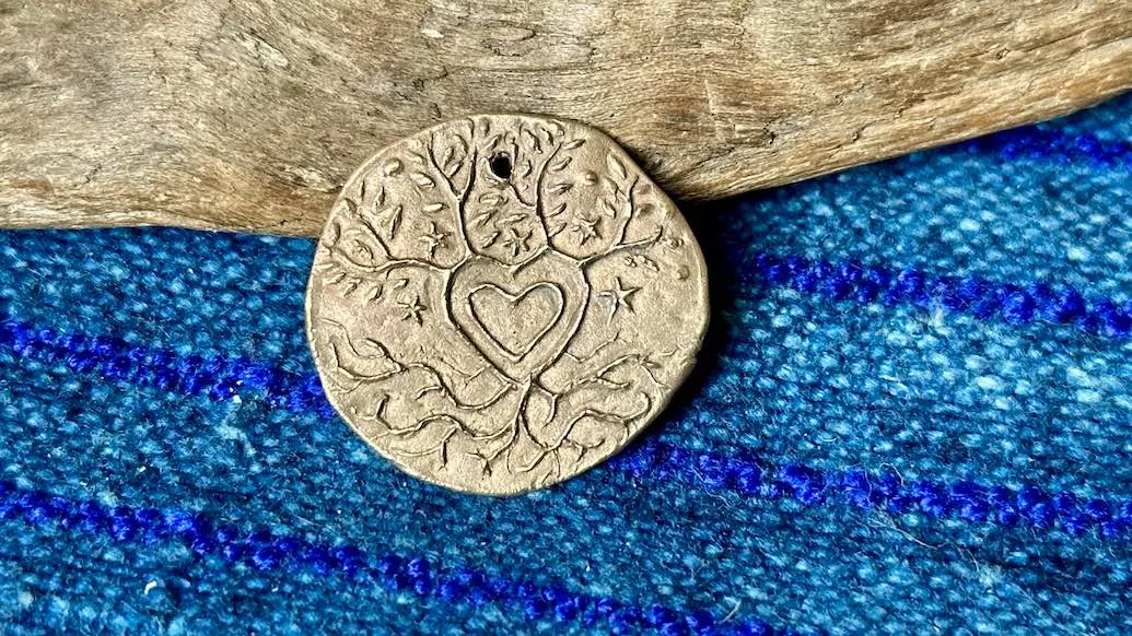 Bronze Pendant by Andrew Thornton - Grounded by Love
