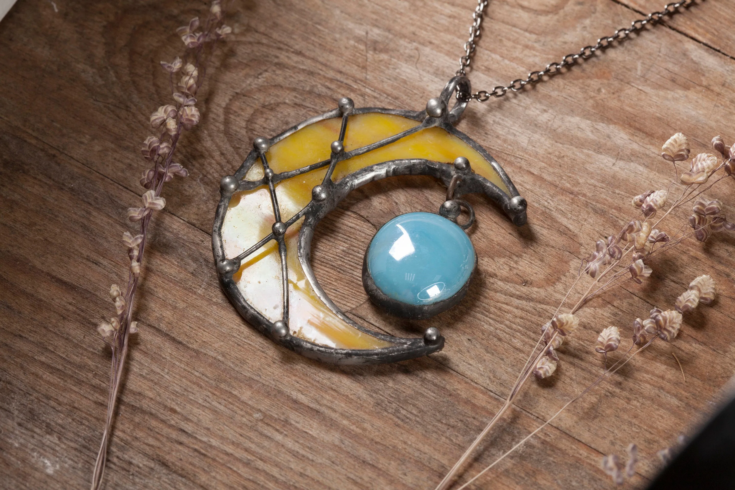 Crescent Yellow Moon with blue drop