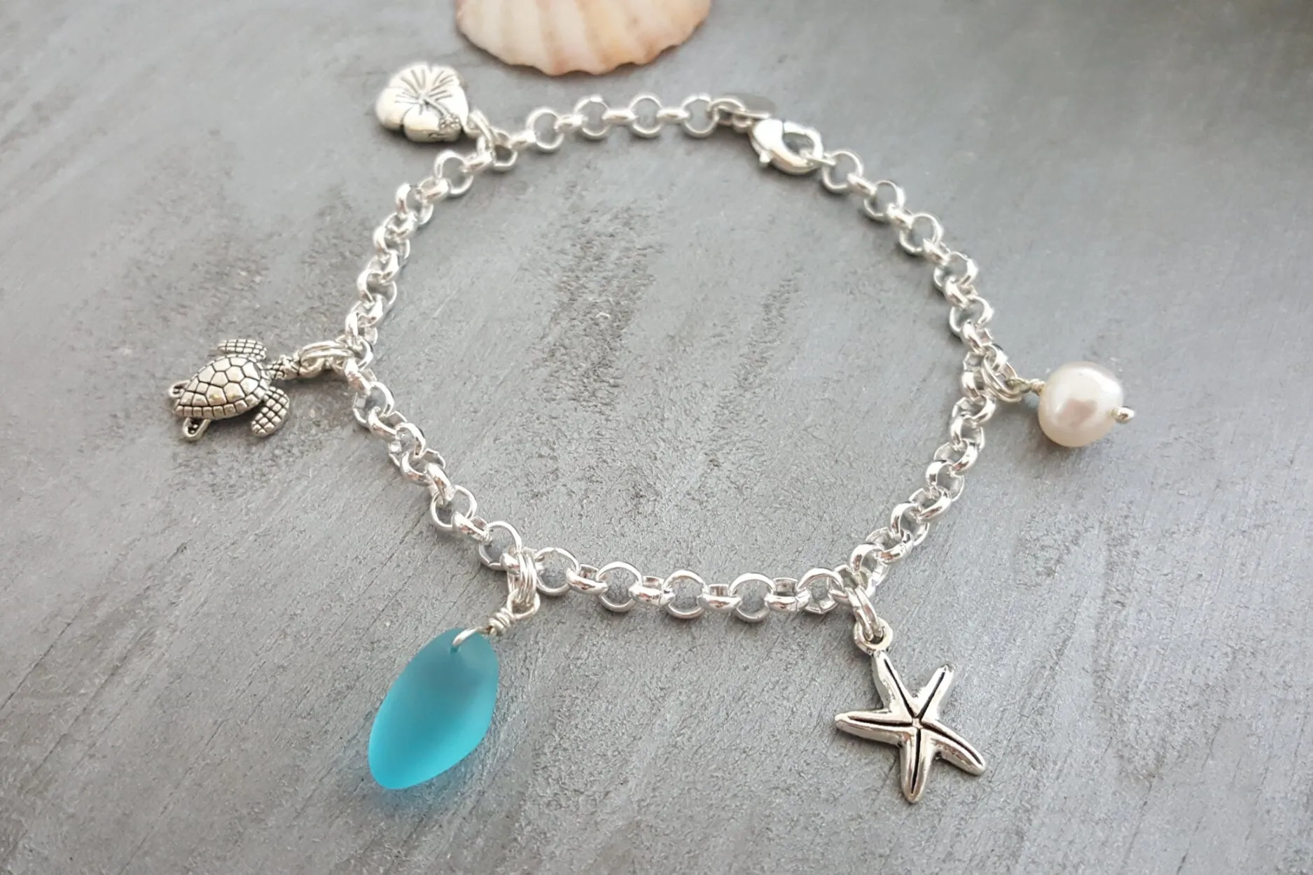 Handmade in Hawaii, Multiple charms blue sea glass chain bracelet, Natural pearl, Hawaiian jewelry