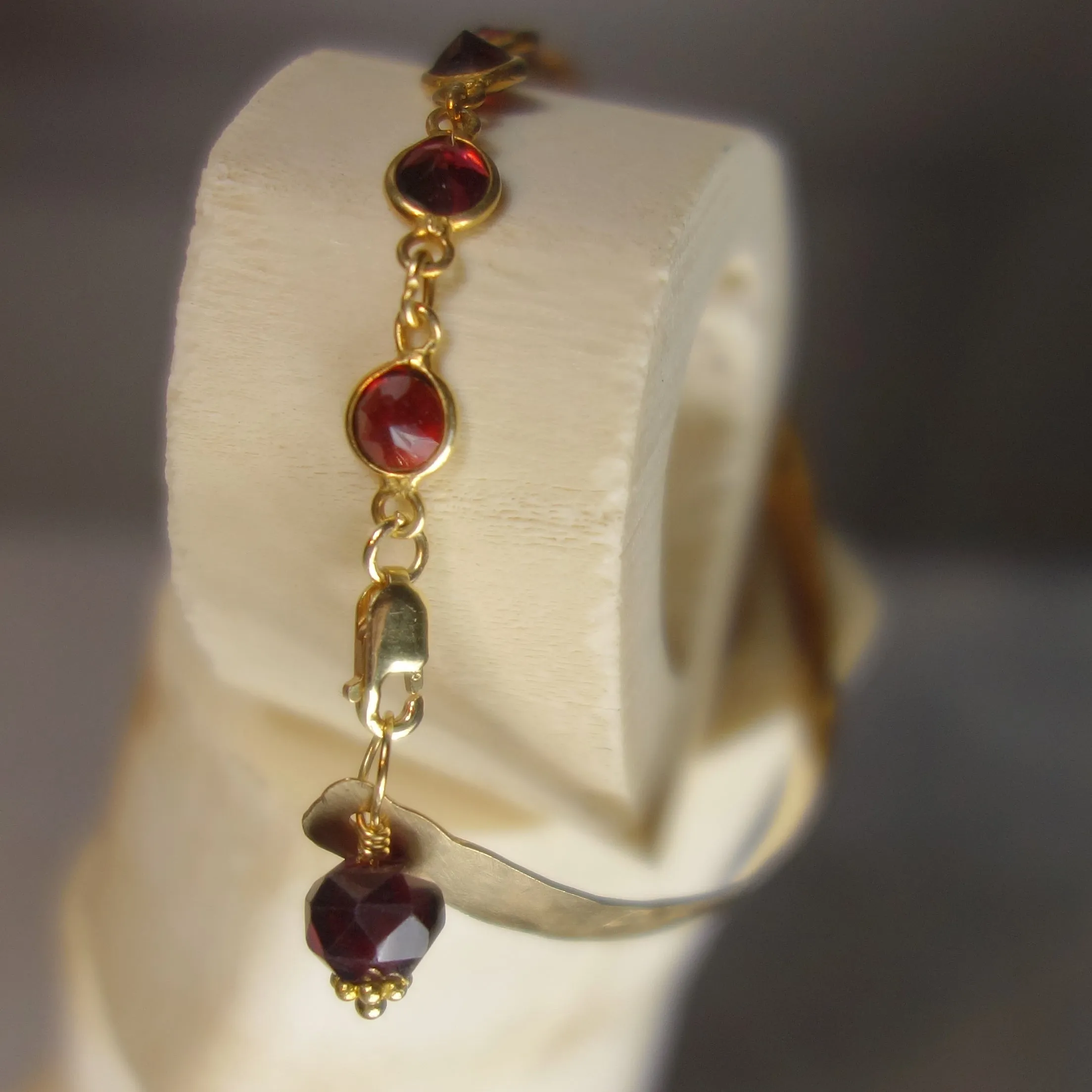 Mr. Darcy, I Presume (hand hammered gold, garnet bangle)