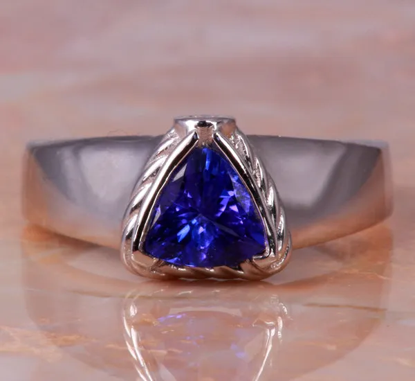 On hold  Christopher Michael Designed .85 Carat Trilliant Tanzanite Ring With Diamond