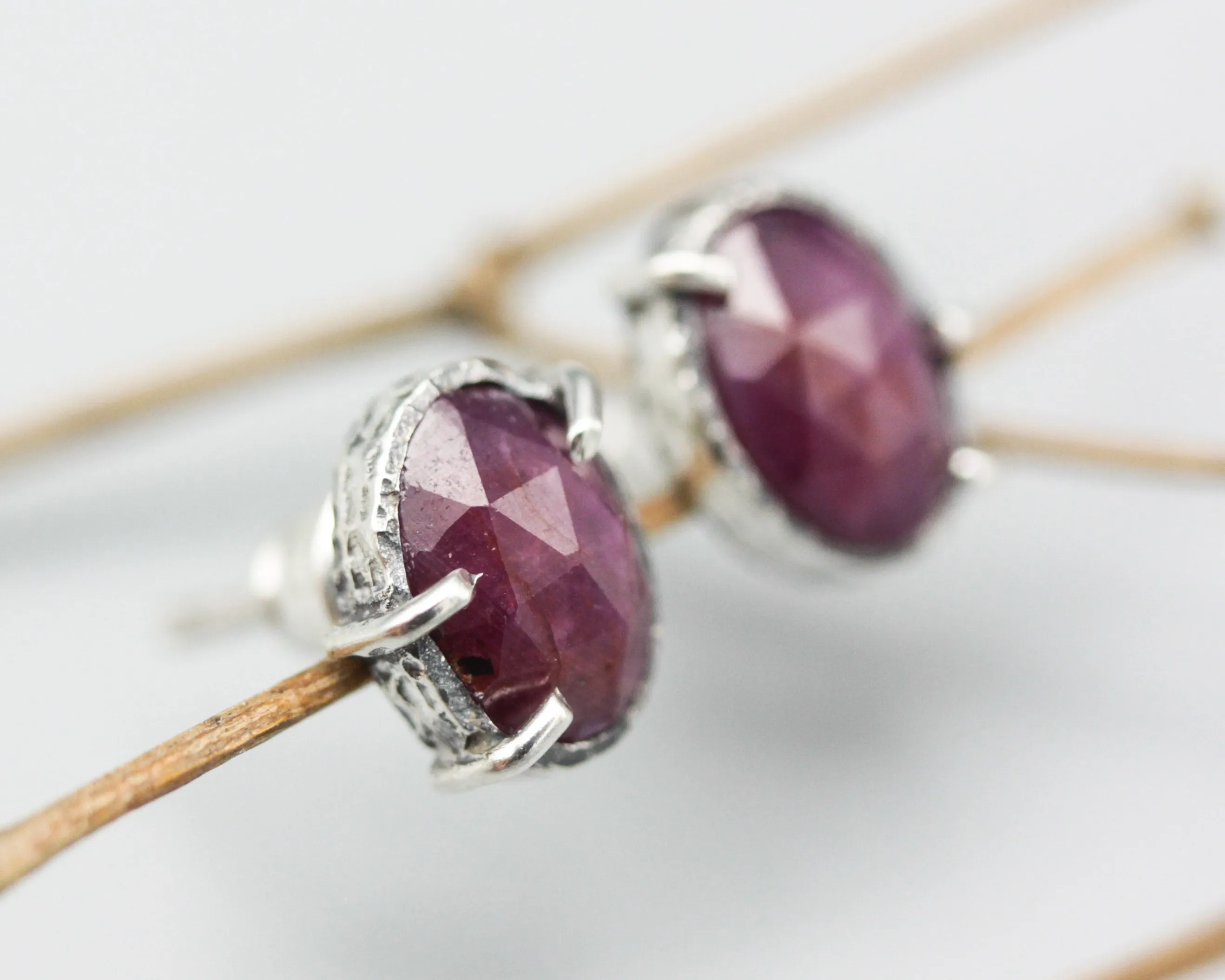 Oval rose cut pink sapphire stud earrings in bezel and prongs setting with sterling silver post and backing