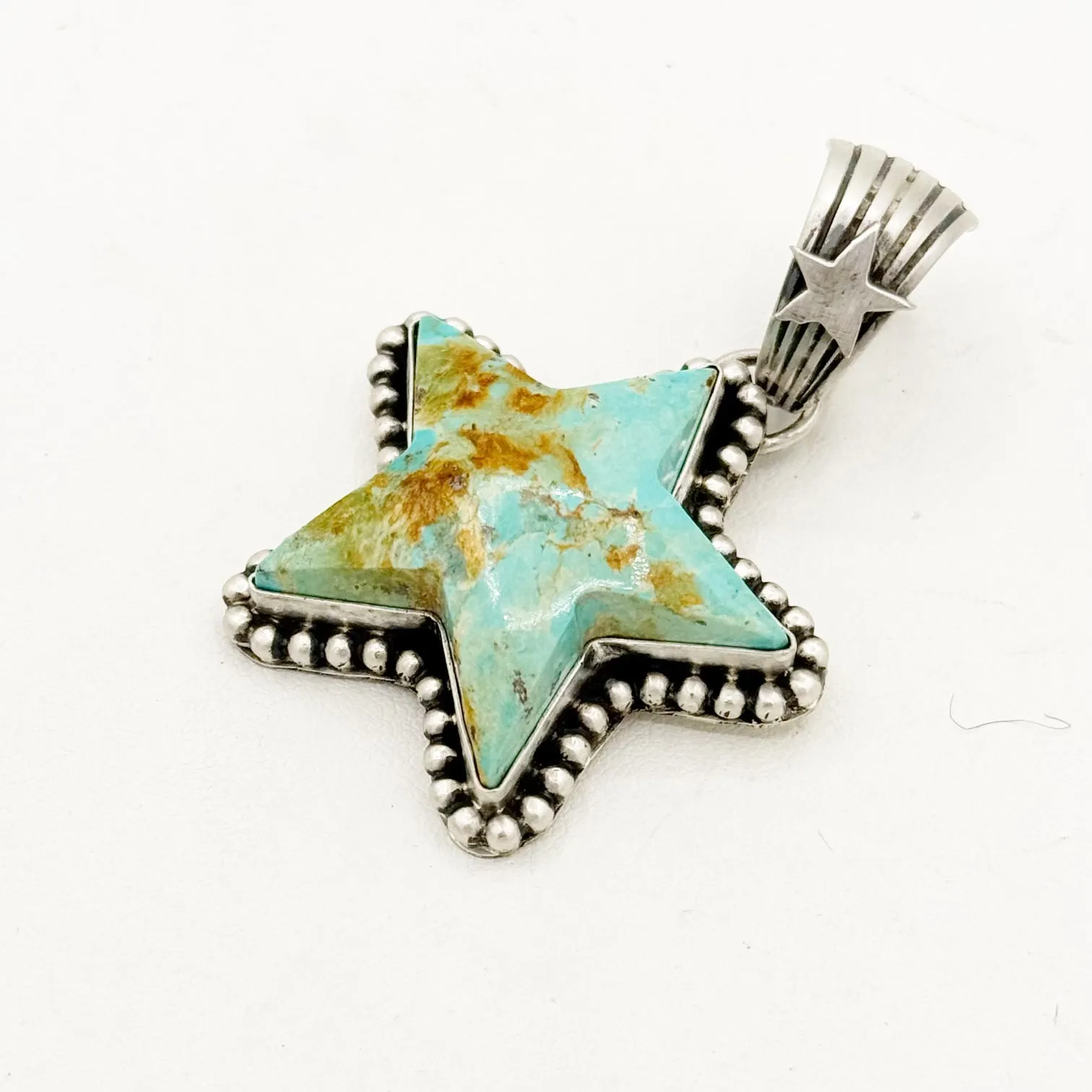 Patrick Yazzie Star Pendants