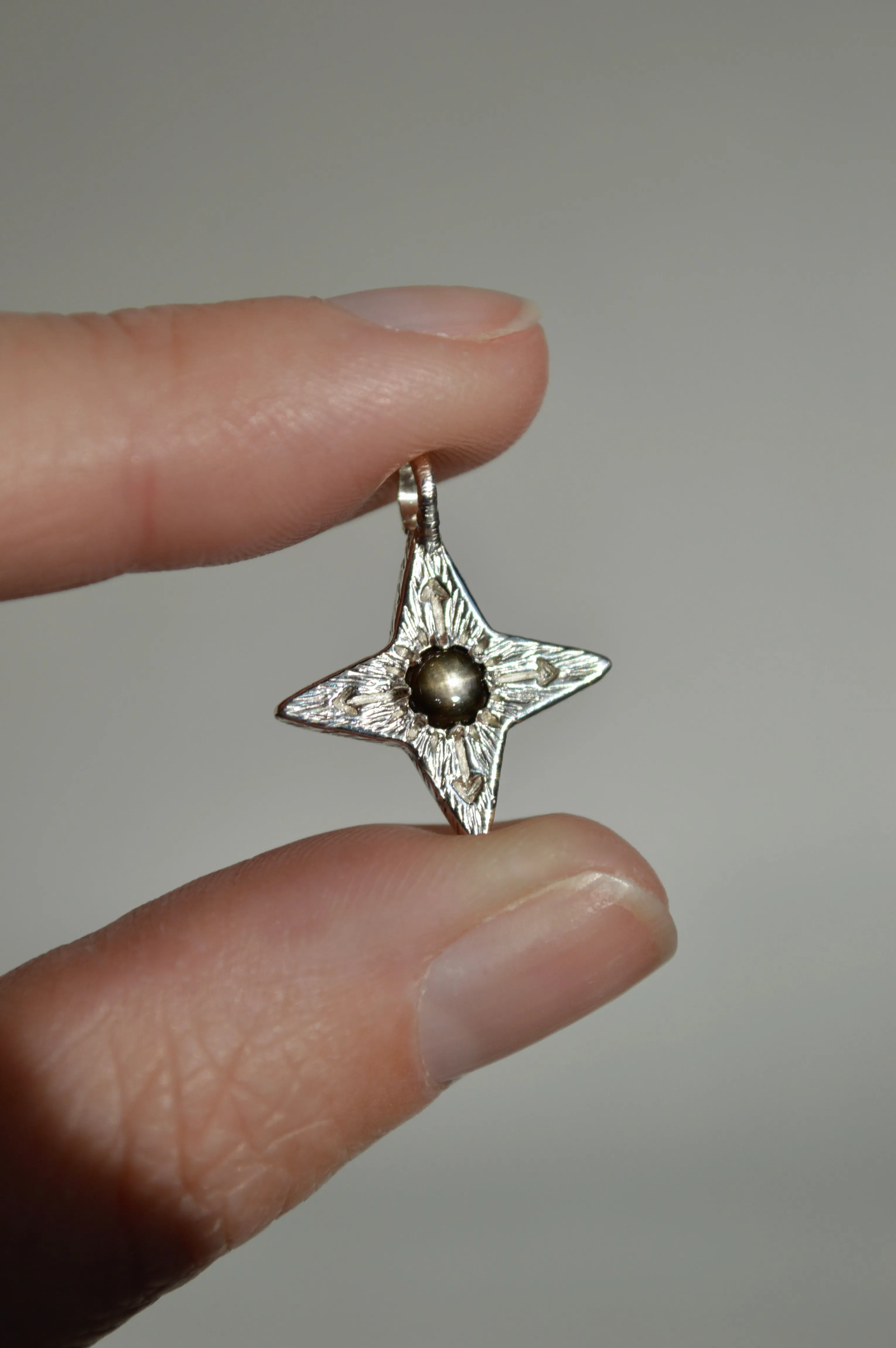 Silver Compass Star with Black Star Sapphire