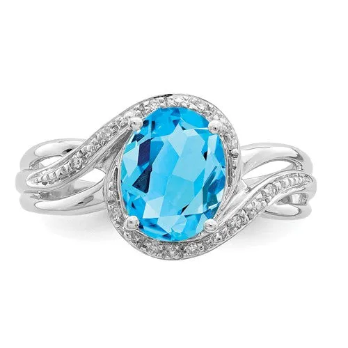Sterling Silver Diamond And Oval Swiss Blue Topaz Ring