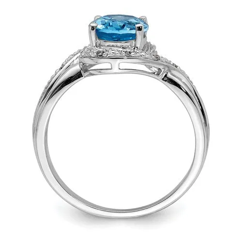 Sterling Silver Diamond And Oval Swiss Blue Topaz Ring