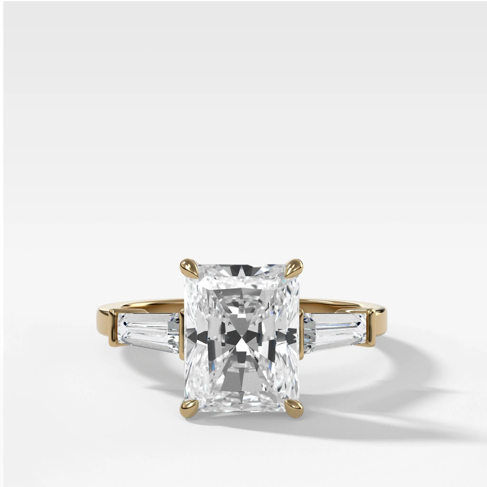 Translunar Tapered Baguette Engagement Ring With Elongated Radiant Cut Diamond