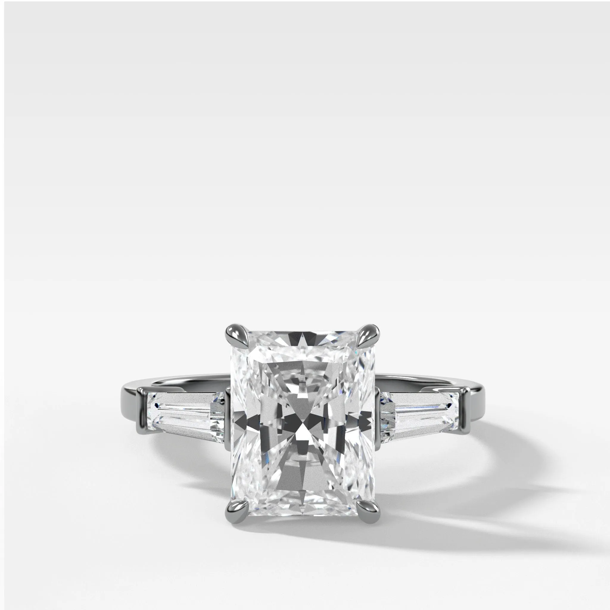 Translunar Tapered Baguette Engagement Ring With Elongated Radiant Cut Diamond